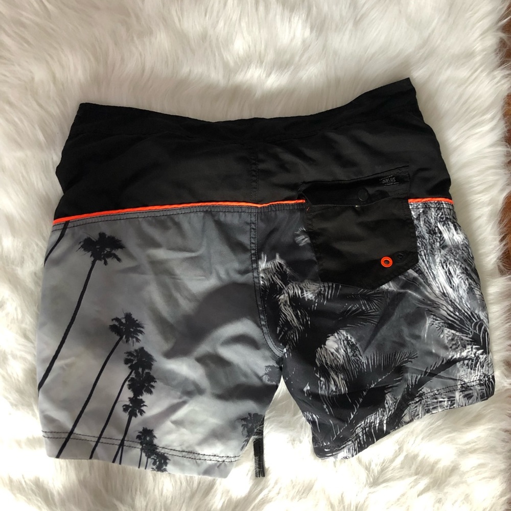 Graphic swim trunks